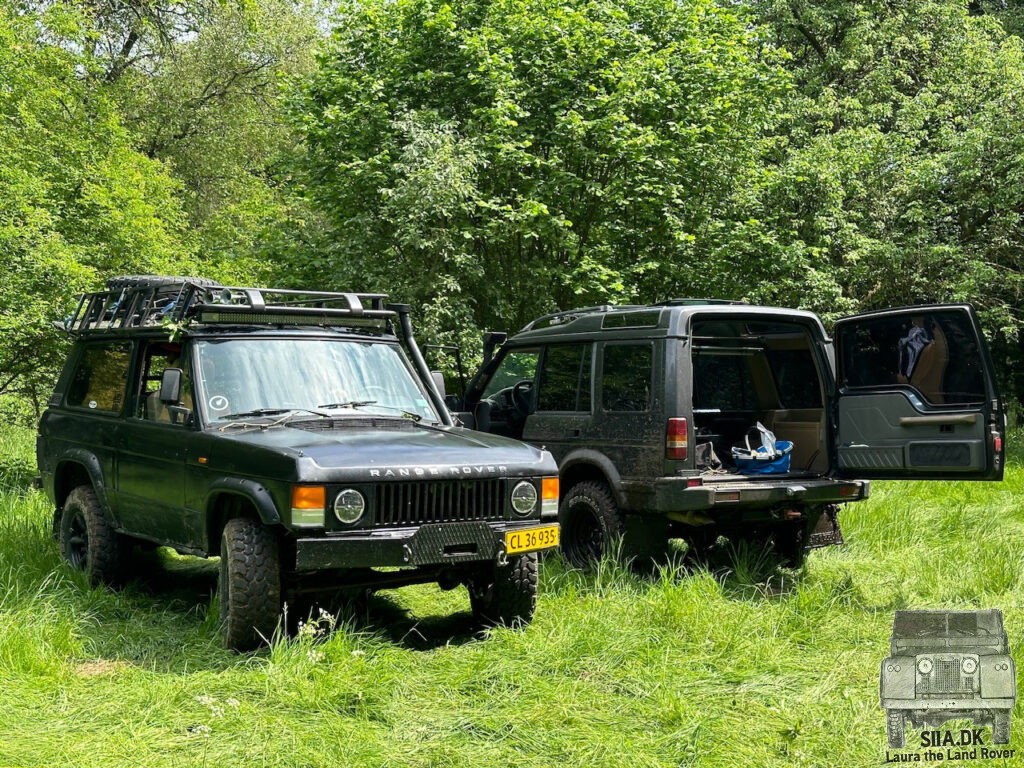 A Range Rover classic V8 and a Land Rover Discovery at a Land Rover Club event